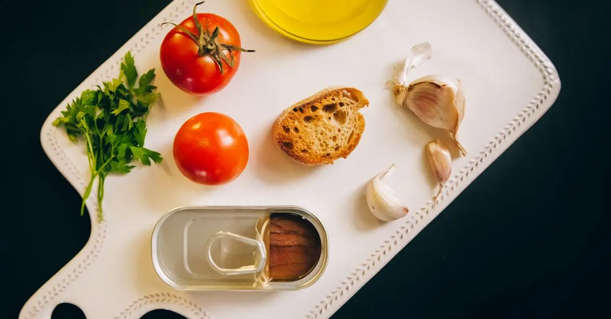 10 Ingredientes Esenciales para Realzar tus Platos Españoles